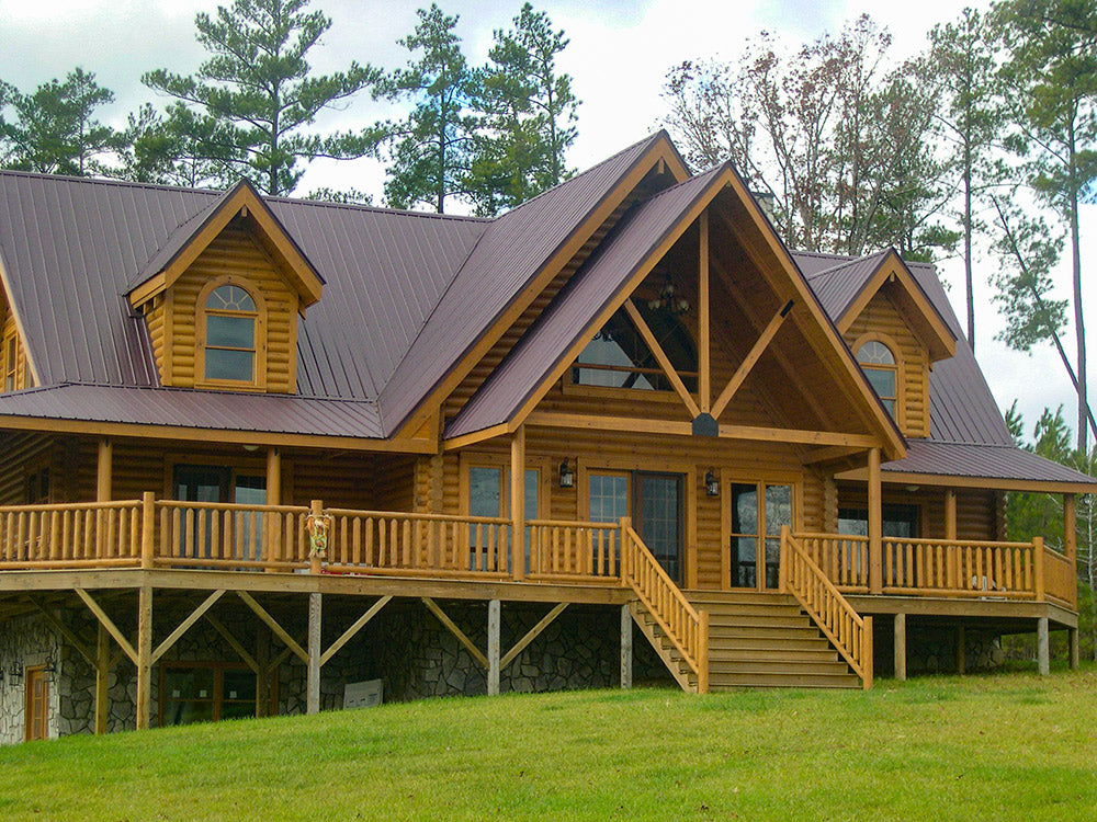8x8 Round-Round Log Home with Saddlenotch Corners and Northern White Cedar Hand-Peeled Log Railing