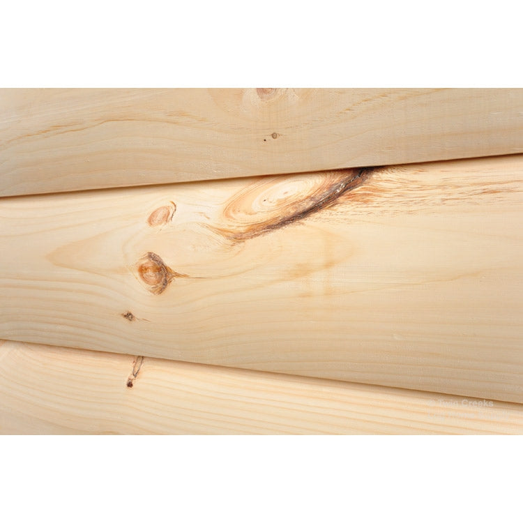 2x12 White Pine "D" Log Siding - Installed Angled Closeup