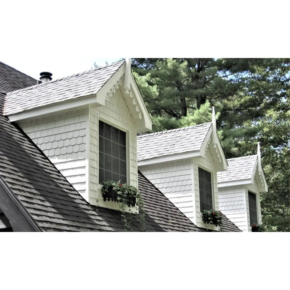 SBC White Cedar Shingles on dormers pre-finished in Concord White color.
