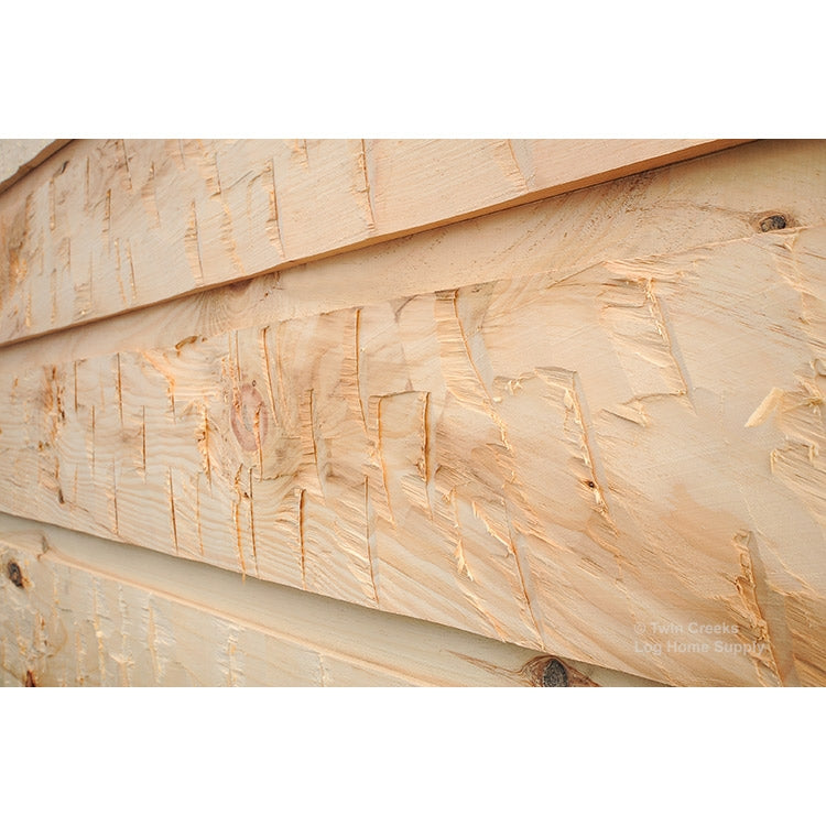 5/4x12 White Pine Chink Log Siding - Square Chink with Rustic Style Hand Hewing (Installed Angled Close)